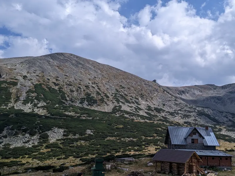 Deno Peak and the old building of Musala Hut